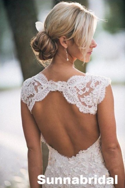 Ivory open back A-line lace chapel train wedding dress