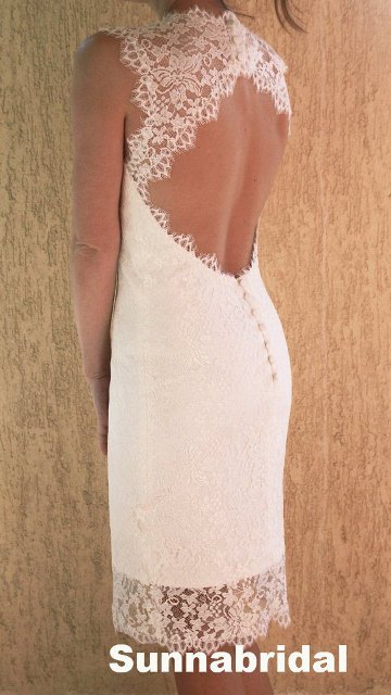 Ivory open back knee length lace wedding dress